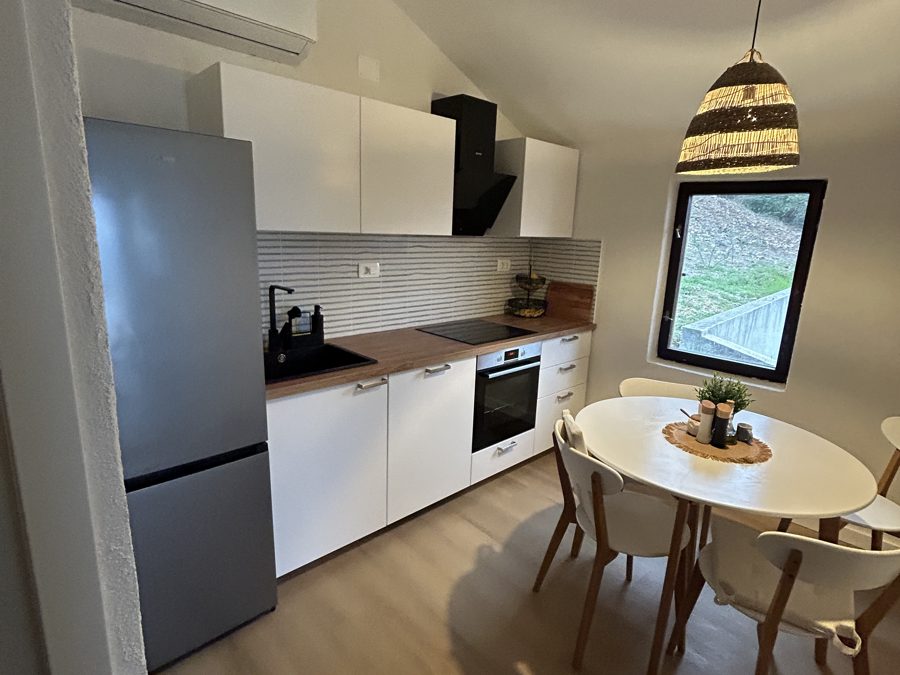 Fully equipped kitchen and dining table for four