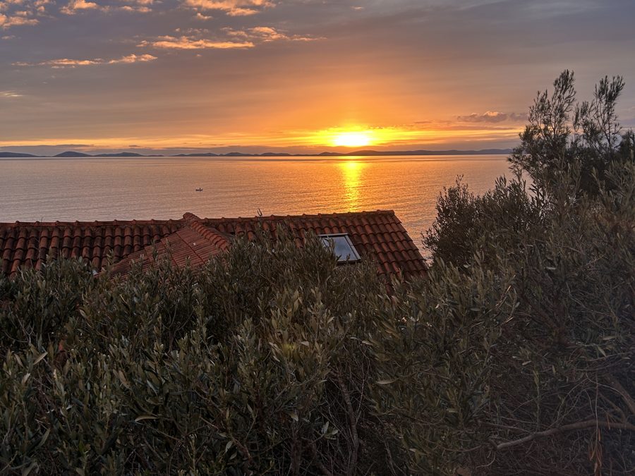View of the sea and islands at sunset from the terrace